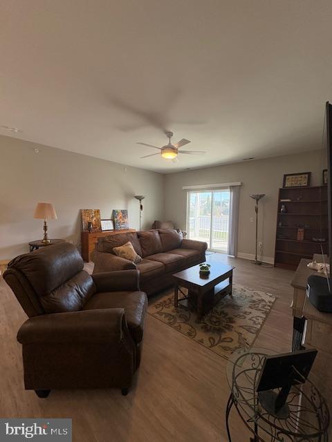 30609 Cedar Neck Road, Unit 3109 Ocean View, DE 19970 - Photo 23 of 44 a living room with furniture and a window