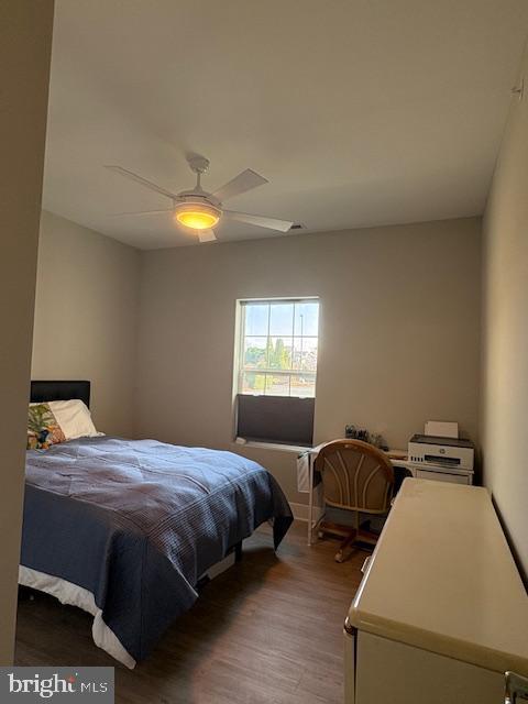 30609 Cedar Neck Road, Unit 3109 Ocean View, DE 19970 - Photo 26 of 44 a bedroom with a bed and a window