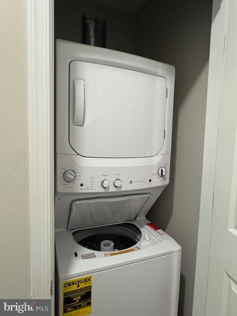 30609 Cedar Neck Road, Unit 3109 Ocean View, DE 19970 - Photo 29 of 44 a utility room with dryer and washer