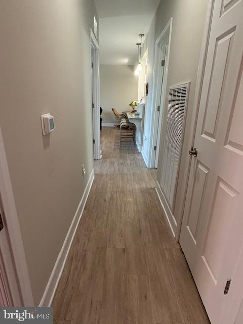 30609 Cedar Neck Road, Unit 3109 Ocean View, DE 19970 - Photo 35 of 44 a view of a hallway with wooden floor