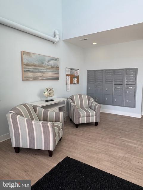 30609 Cedar Neck Road, Unit 3109 Ocean View, DE 19970 - Photo 7 of 44 a spacious bedroom with a bed and a couch