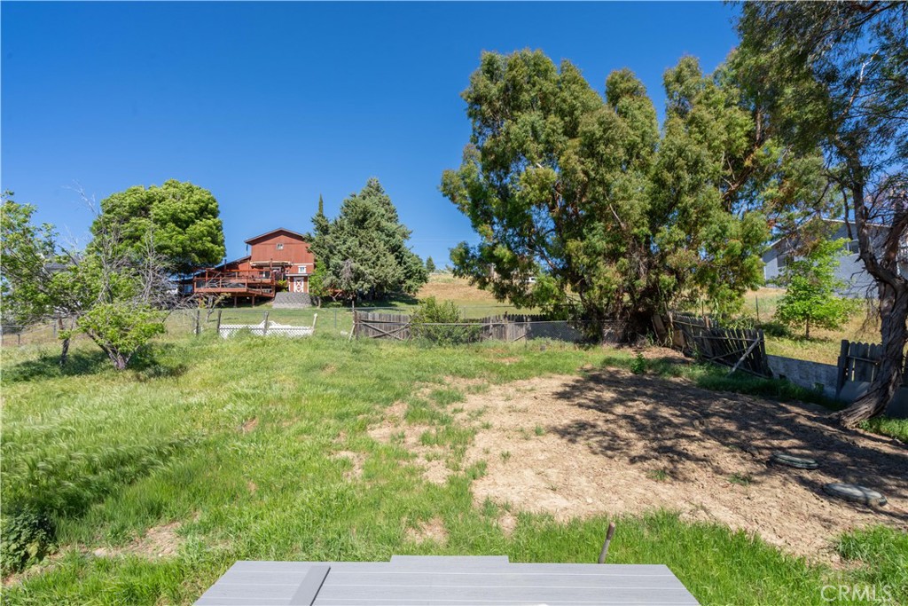 42640 Ranch Club Road Lake Hughes, CA 93532 - Photo 23 of 27 a view of a garden with a fountain