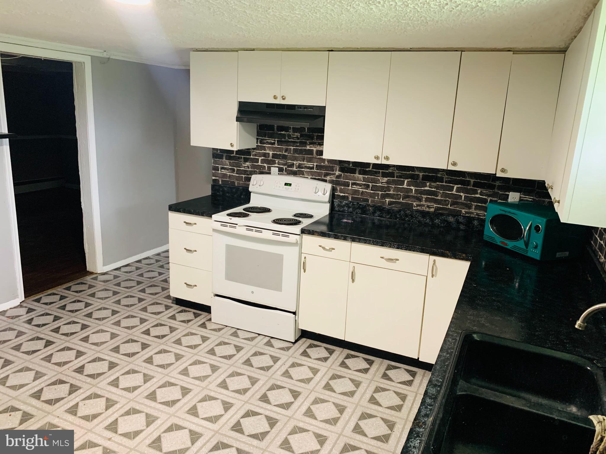 1553 Governor Bridge Road Davidsonville, MD 21035 - Photo 18 of 26 Basement level kitchenette.