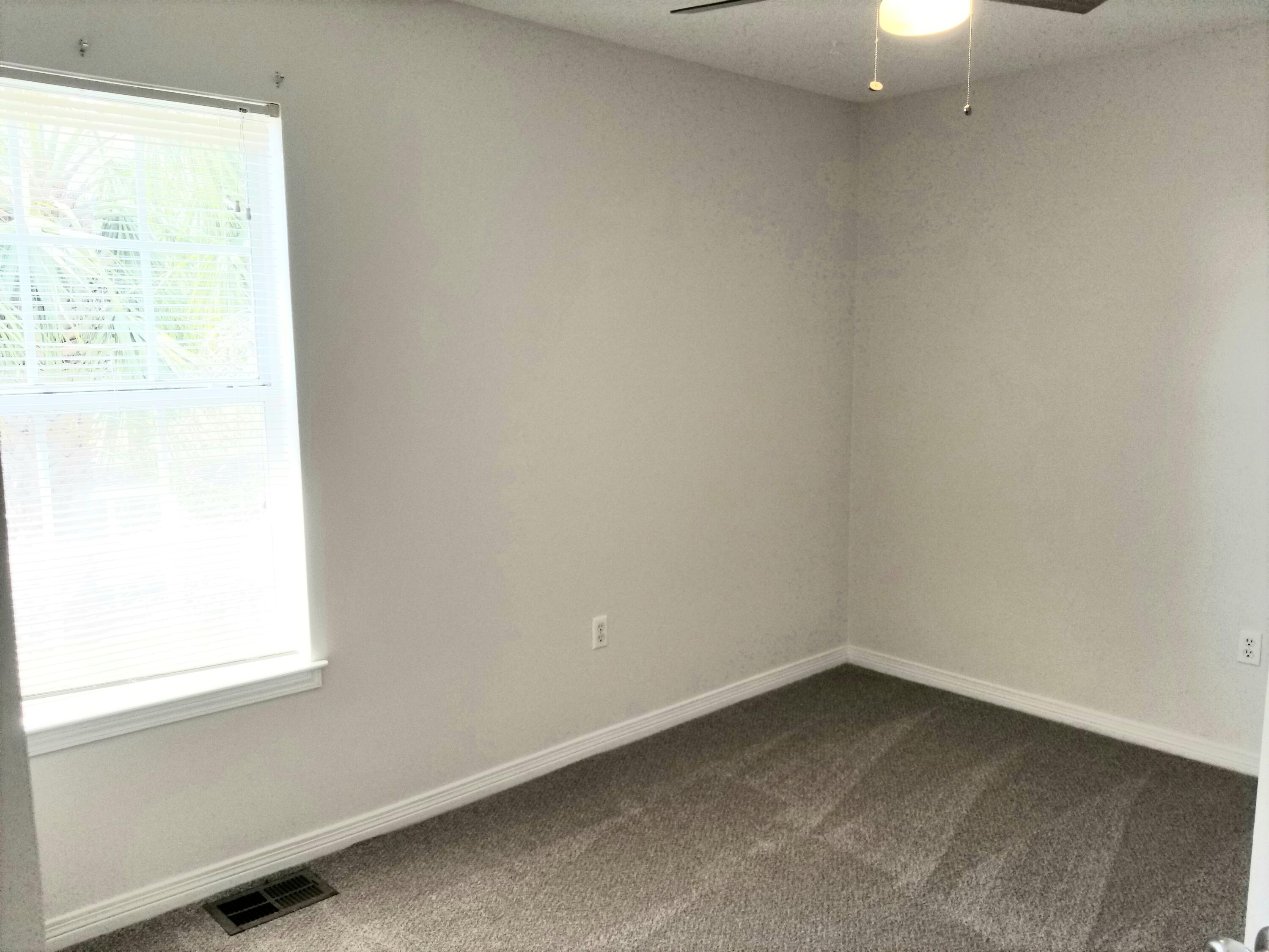 307 Rue Dianne Mary Esther, FL 32569 - Photo 14 of 17 an empty room with a window