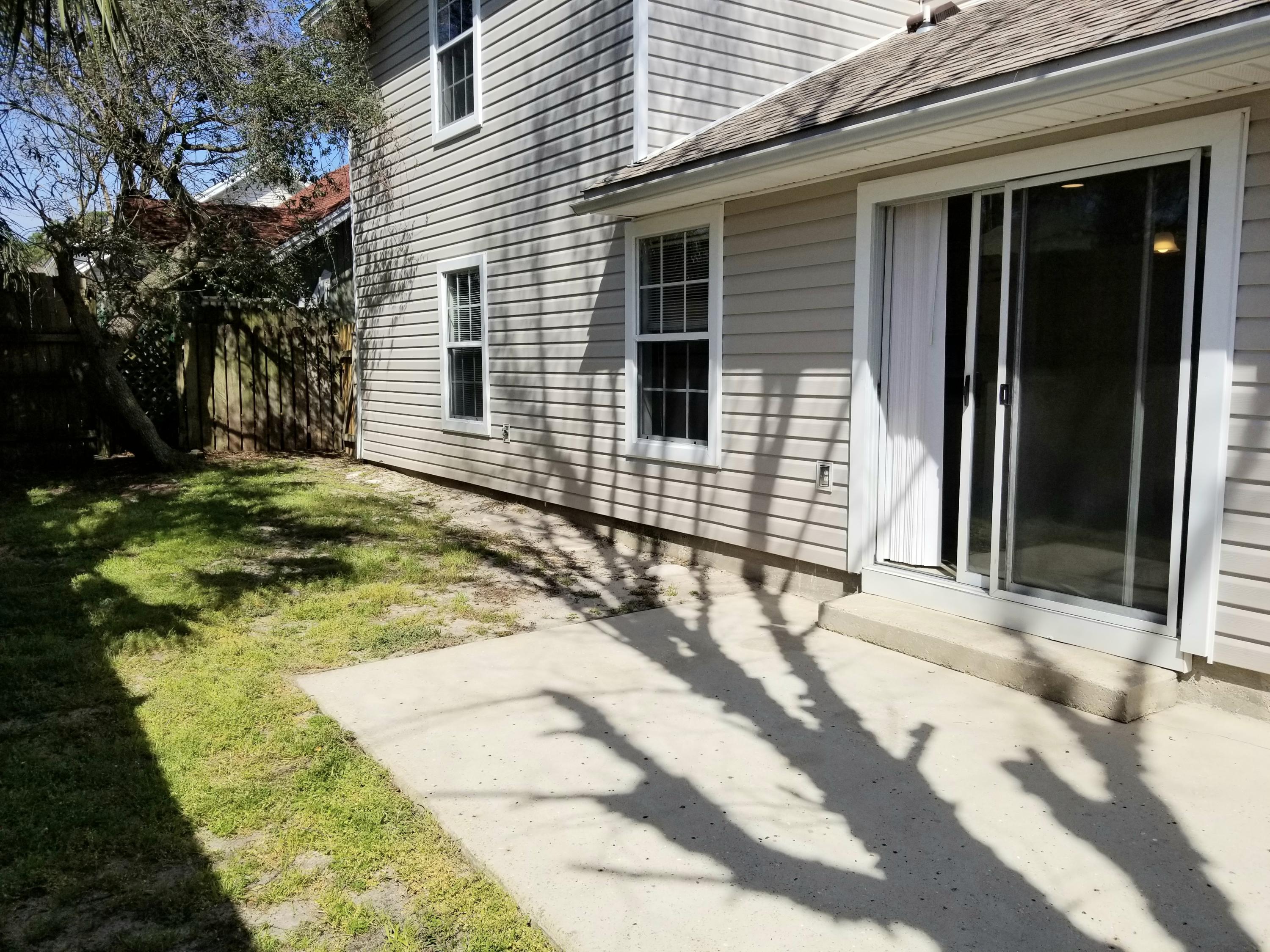 307 Rue Dianne Mary Esther, FL 32569 - Photo 16 of 17 a view of a backyard of the house