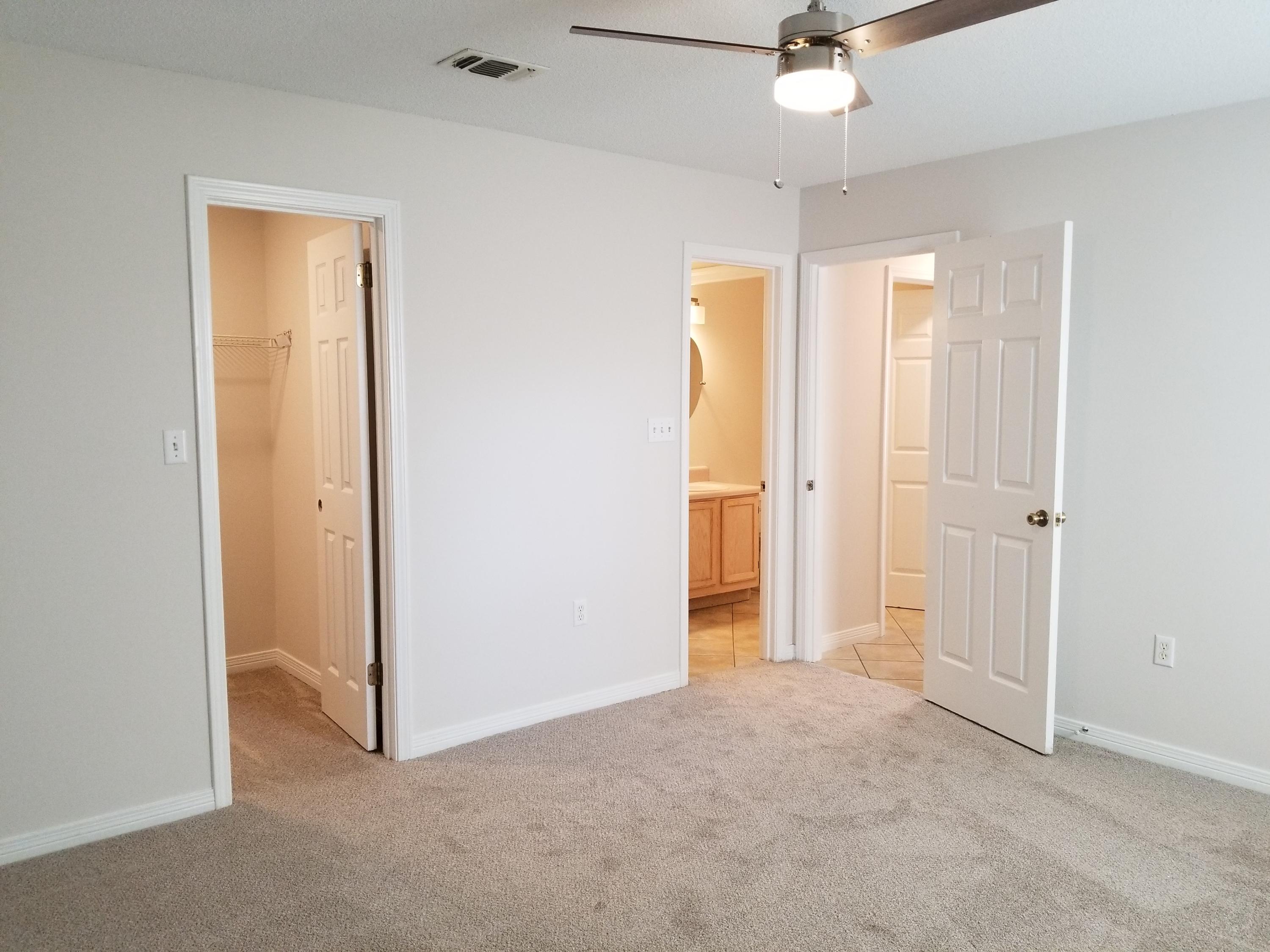 307 Rue Dianne Mary Esther, FL 32569 - Photo 5 of 17 an empty room with a ceiling fan and shower