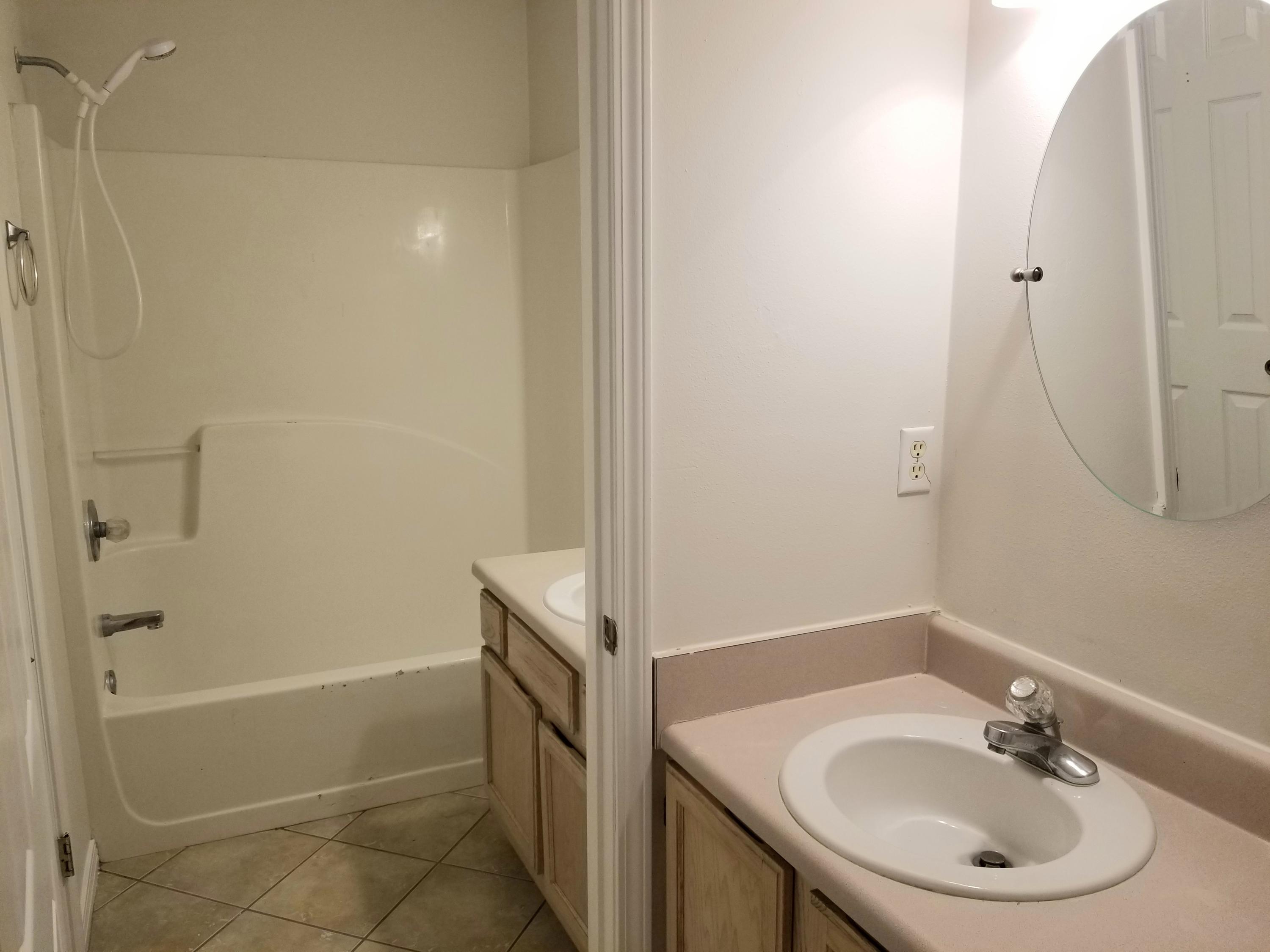 307 Rue Dianne Mary Esther, FL 32569 - Photo 6 of 17 a bathroom with a sink and a mirror