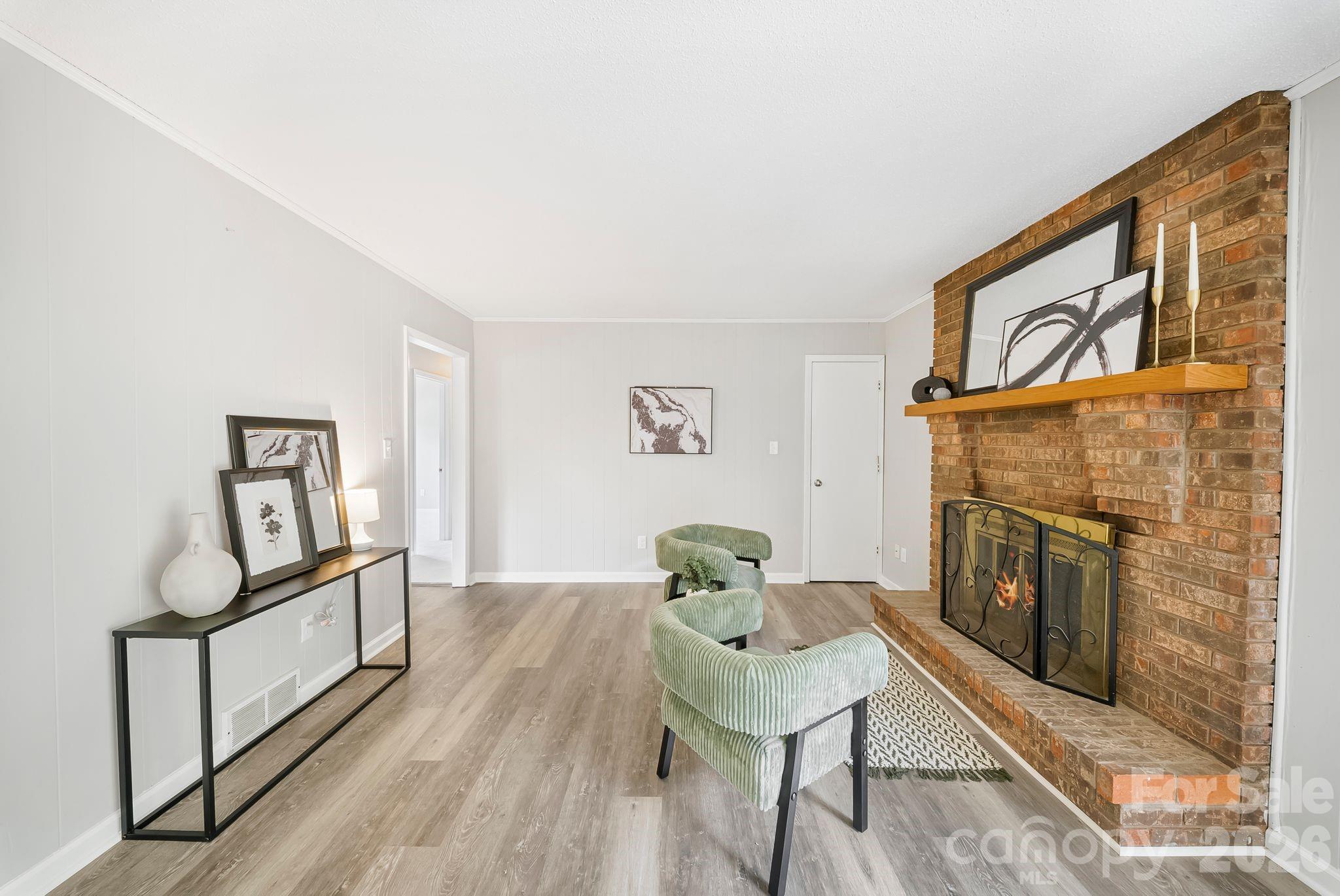 16 Sun Valley Court Alexander, NC 28701 - Photo 20 of 47 a living room with furniture and a fireplace