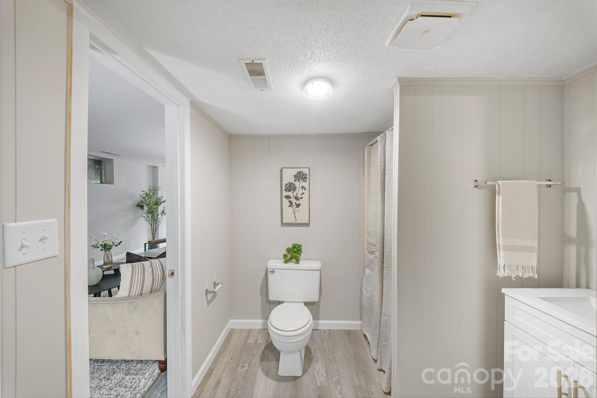 16 Sun Valley Court Alexander, NC 28701 - Photo 29 of 47 a bathroom with a toilet