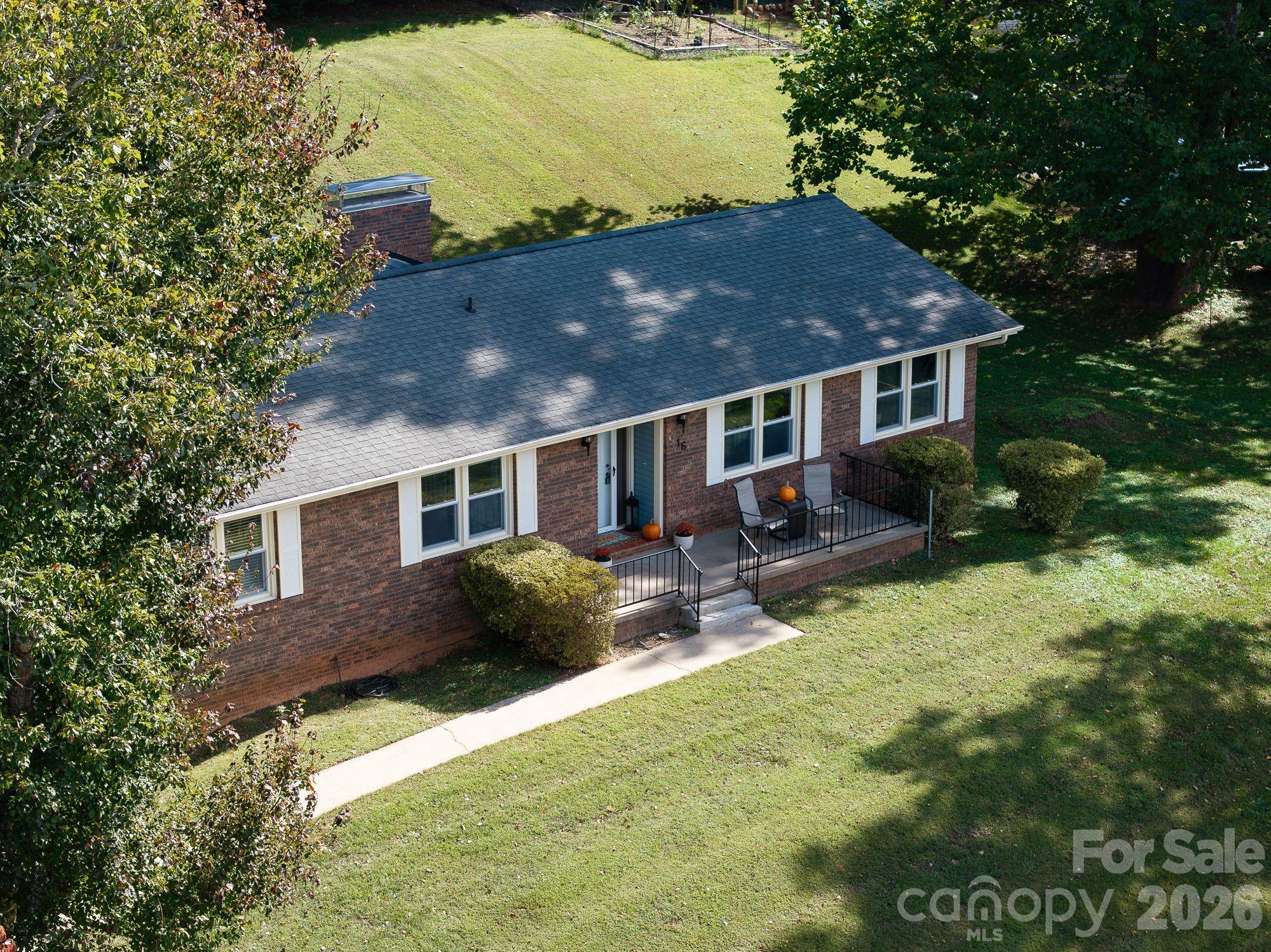 16 Sun Valley Court Alexander, NC 28701 - Photo 8 of 47 a house view with a garden space