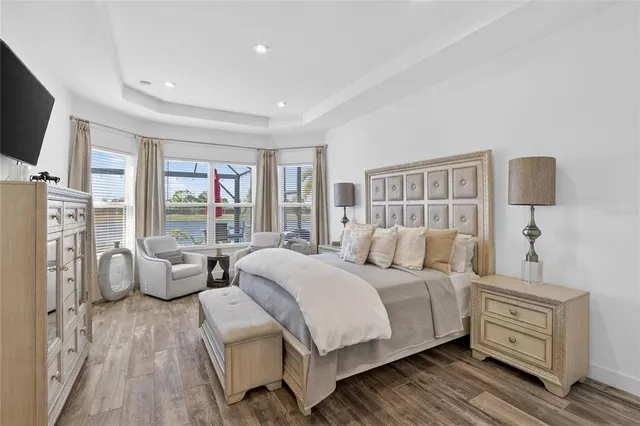 a view of a porch with a floor to ceiling windows and yard