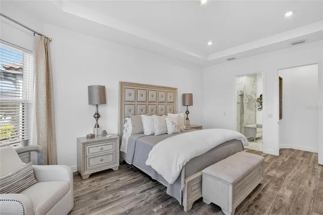 an aerial view of a house with a ocean view