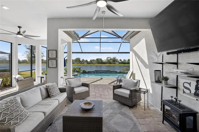 a view of a golf course with a lake view