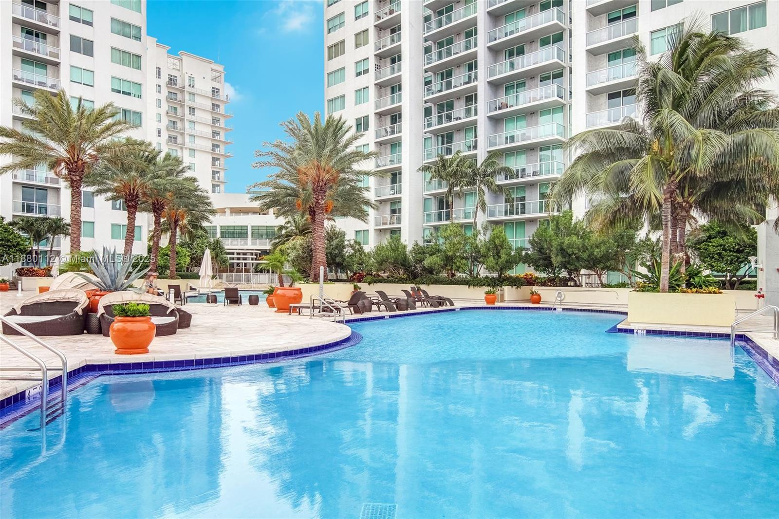 244 Biscayne Boulevard, Unit 4608 Miami, FL 33132 - Photo 45 of 45 a swimming pool with outdoor seating and yard