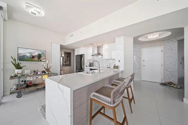 a view of a dining room with furniture and a livingroom