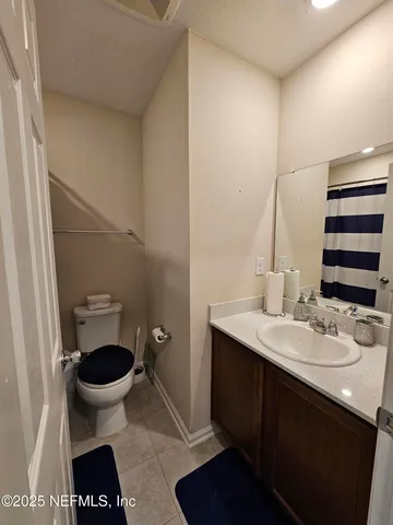 a bathroom with a toilet and a sink