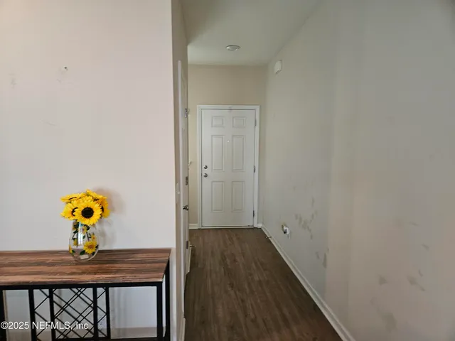 a view of dining room and wooden floor