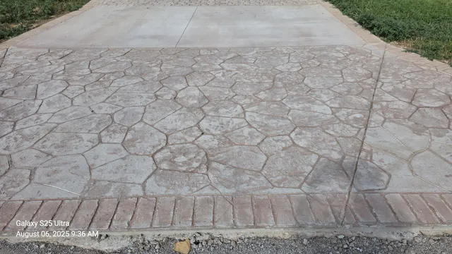 a kitchen with a refrigerator and a sink