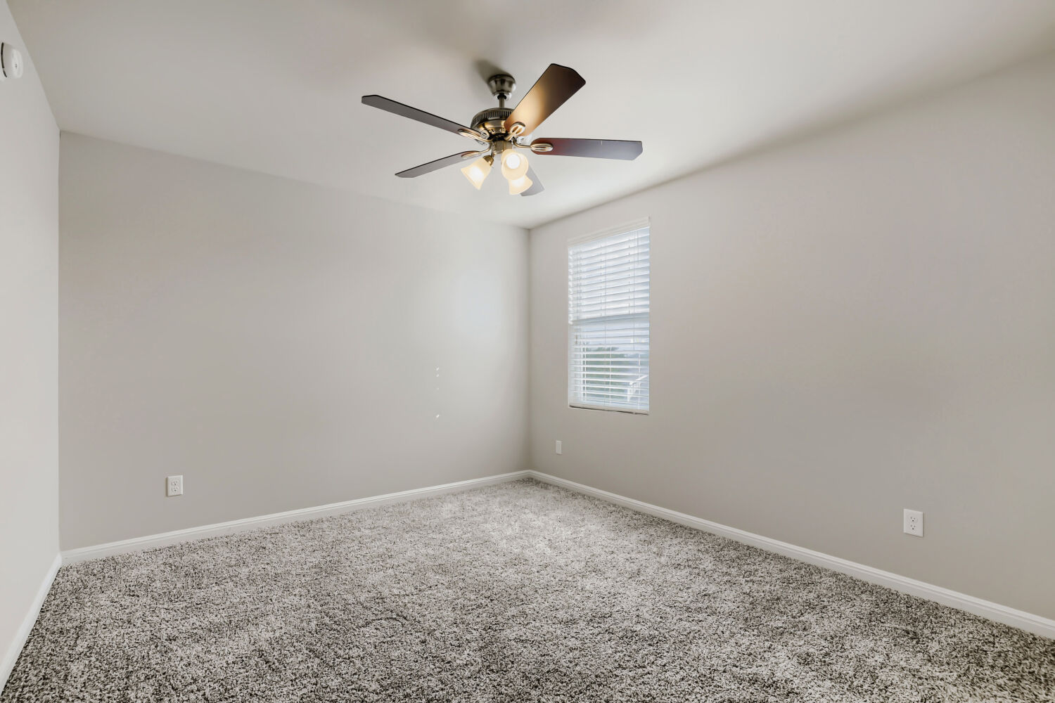 5136 Hellman Kyle, TX 78640 - Photo 21 of 25 a view of a livingroom with a ceiling fan and window