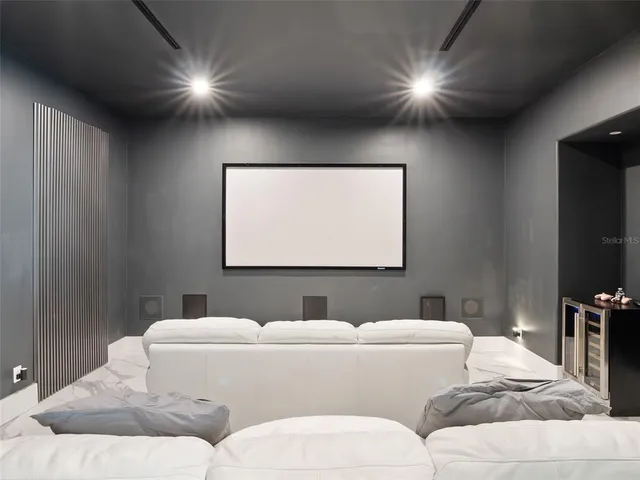 a utility room with sink dryer and washer