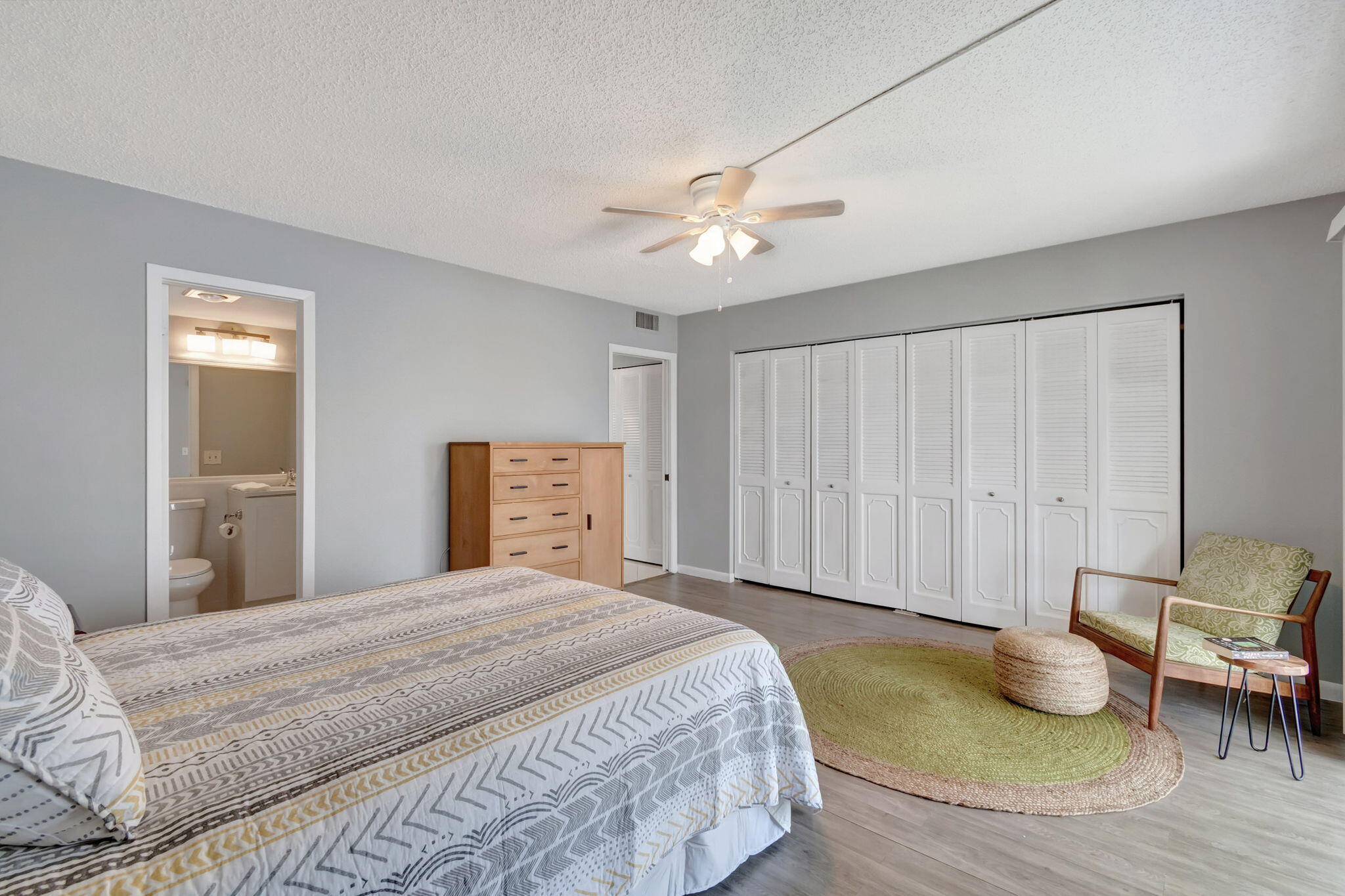3031 Cornwall East Boca Raton, FL 33434 - Photo 18 of 84 a bedroom with a bed and furniture