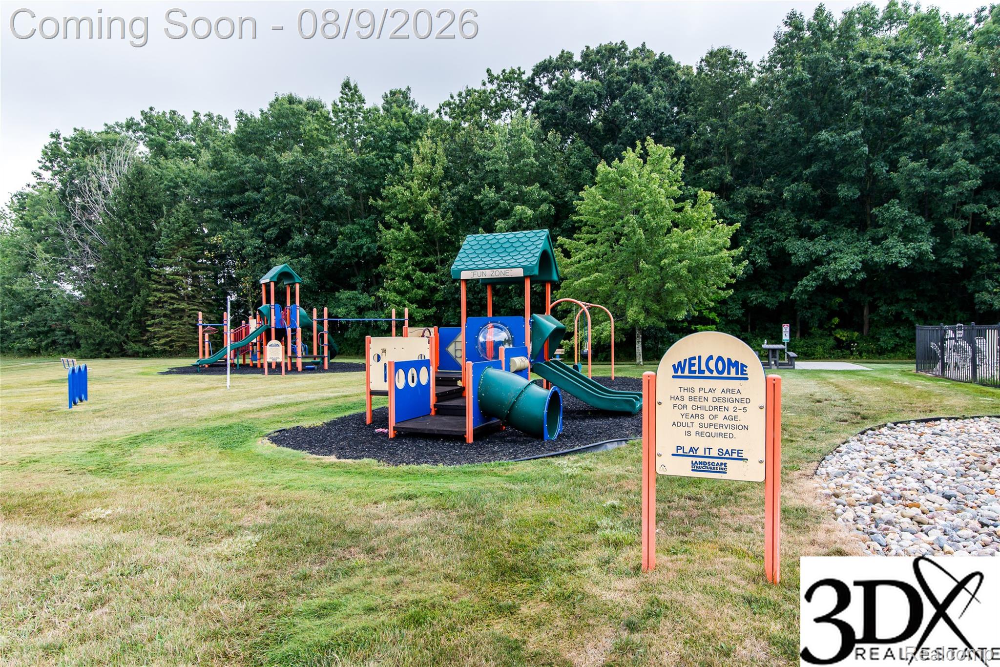 4256 Hampton Ridge Boulevard Howell, MI 48843 - Photo 5 of 26 Outdoor recreational space with multiple play structures, a slide, and a tunnel