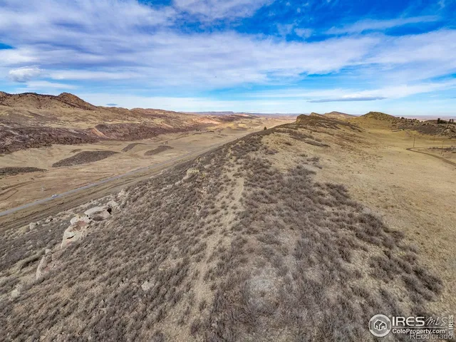 a view of mountain view with mountains in the background