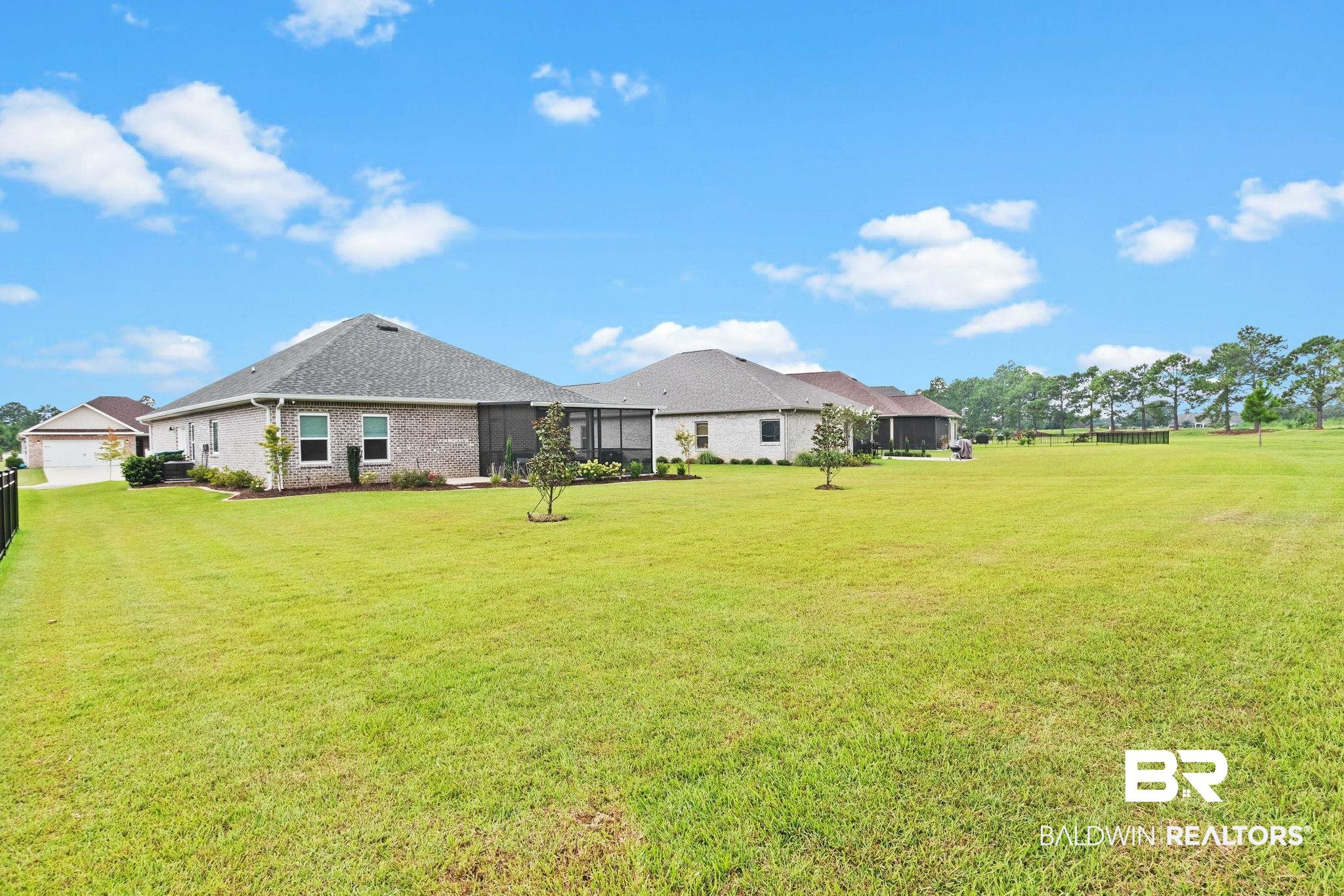 9815 Lakeview Drive Foley, AL 36535 - Photo 71 of 100 View of yard with a garage