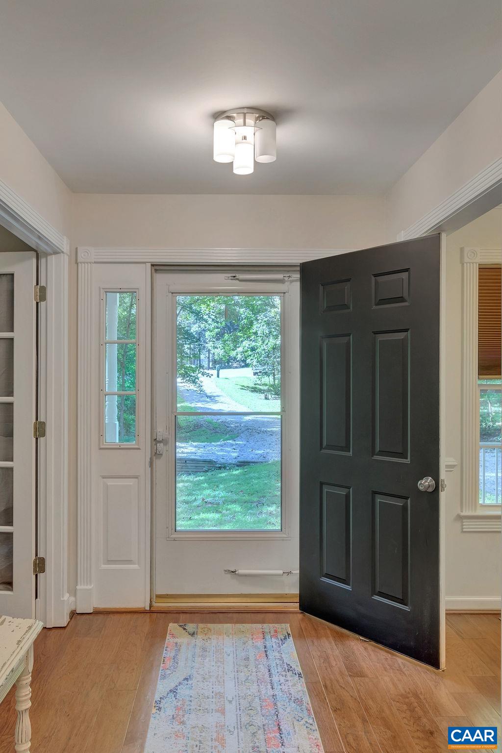 421 Rudolph Street Ruckersville, VA 22968 - Photo 16 of 42 an empty room with wooden floor and windows