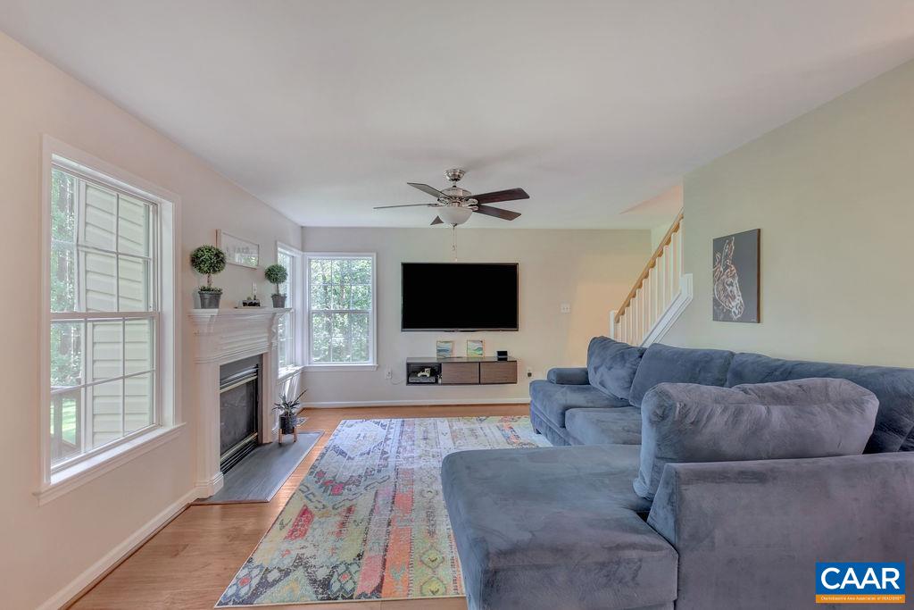 421 Rudolph Street Ruckersville, VA 22968 - Photo 24 of 42 a living room with furniture and a flat screen tv