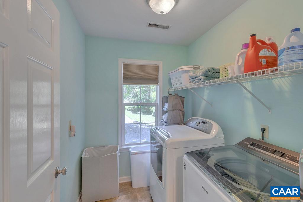 421 Rudolph Street Ruckersville, VA 22968 - Photo 29 of 42 a utility room with sink dryer and washer