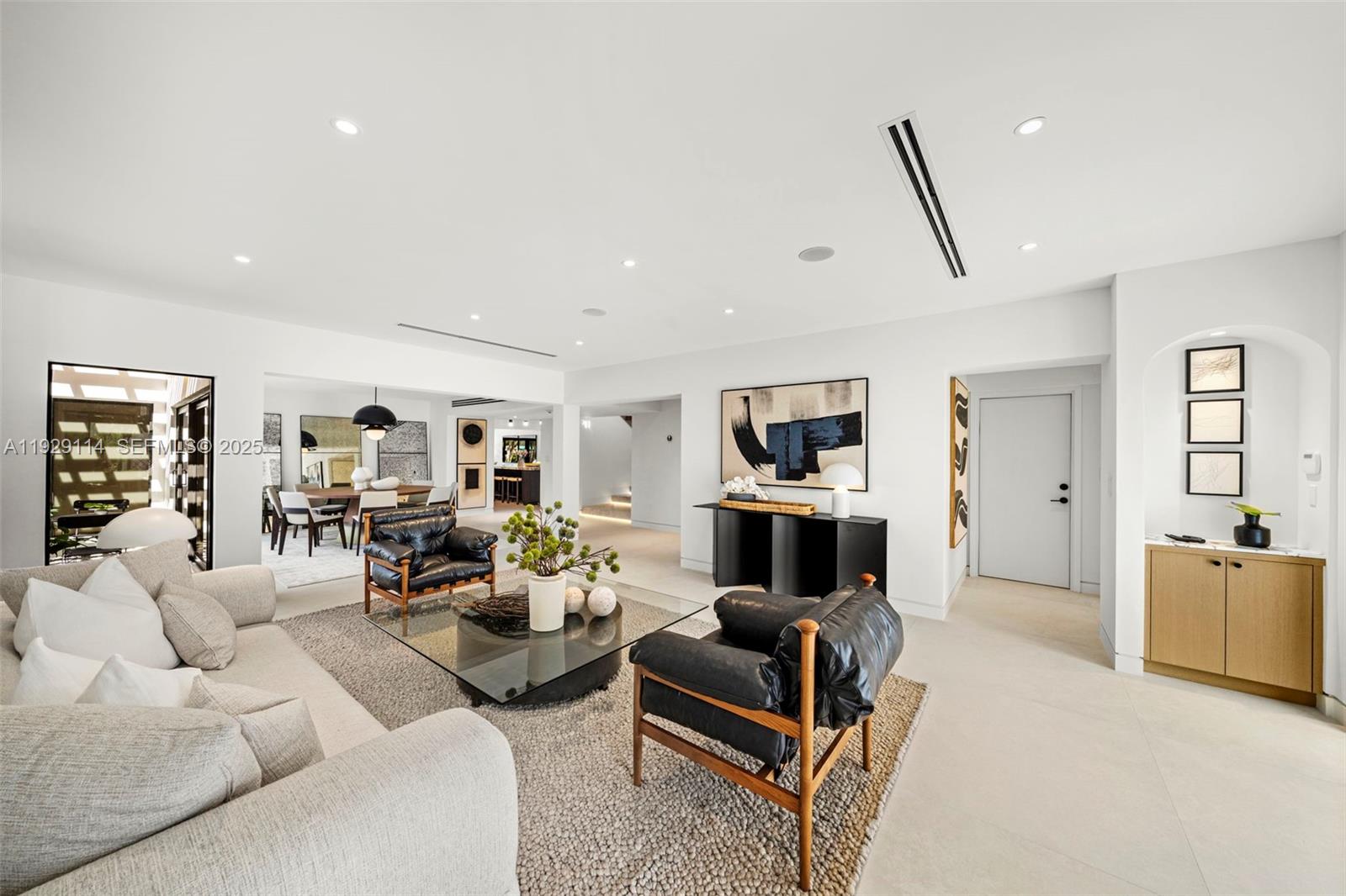 1815 Fairhaven Place Miami, FL 33133 - Photo 11 of 59 a living room with furniture and a flat screen tv