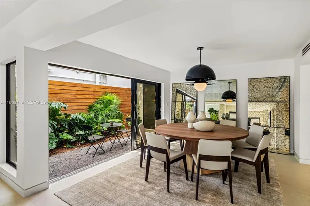 a kitchen with stainless steel appliances granite countertop a sink and stove