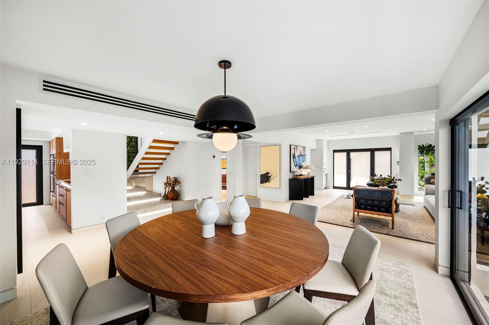 1815 Fairhaven Place Miami, FL 33133 - Photo 13 of 59 a view of a dining room with furniture