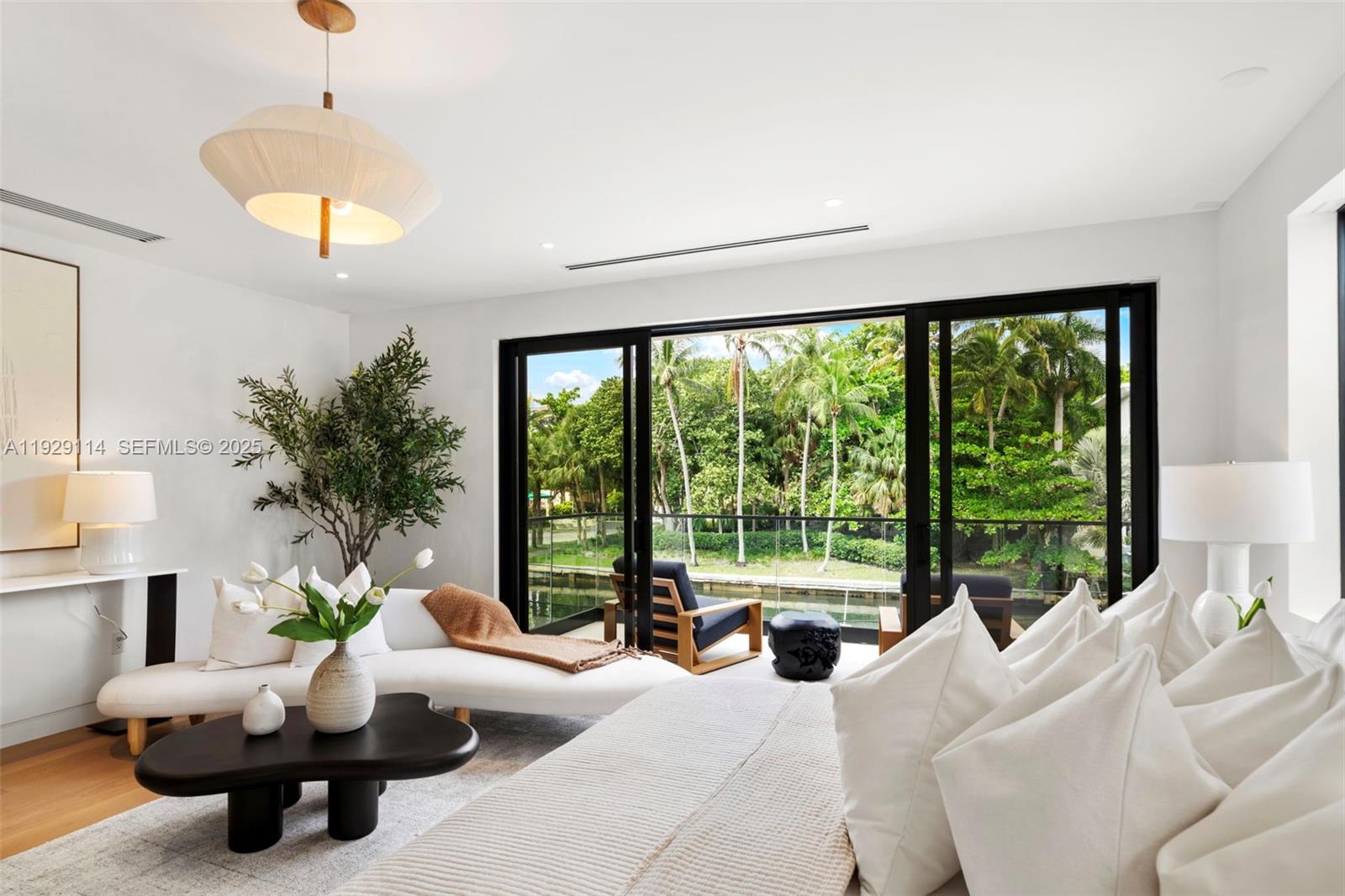 1815 Fairhaven Place Miami, FL 33133 - Photo 22 of 59 a living room with furniture and a large window