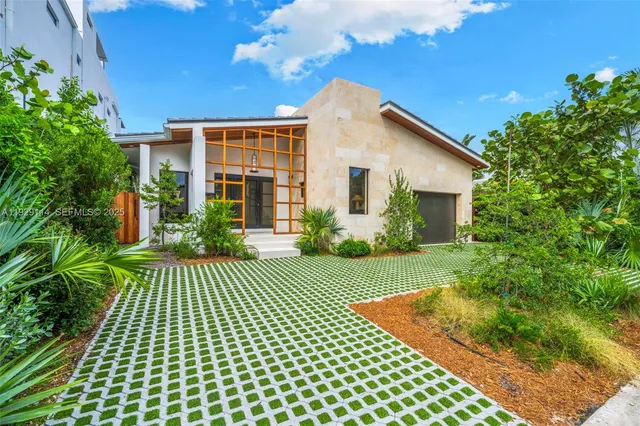 a view of a house with a garden
