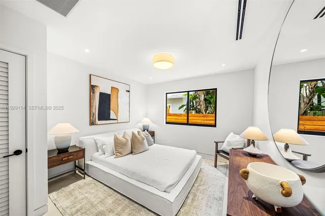 a view of house with outdoor space and sitting area