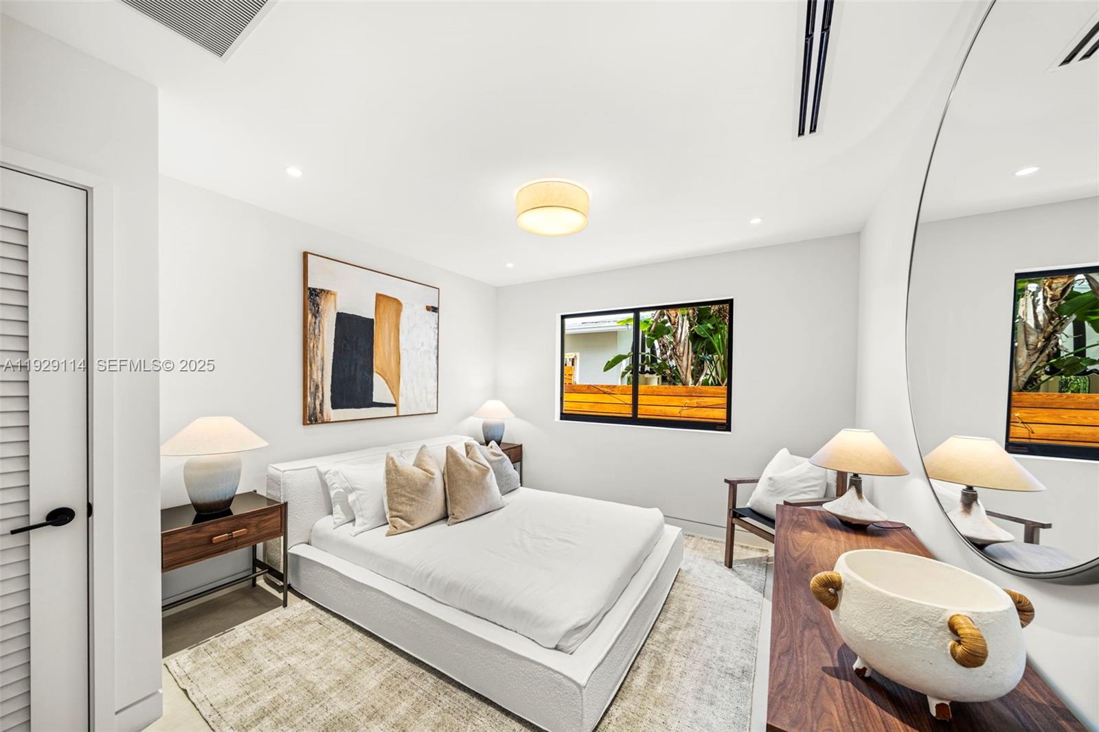 1815 Fairhaven Place Miami, FL 33133 - Photo 37 of 59 a living room with furniture and a window
