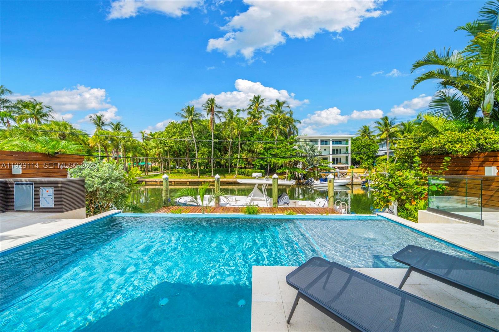 1815 Fairhaven Place Miami, FL 33133 - Photo 42 of 59 a view of a house with a swimming pool