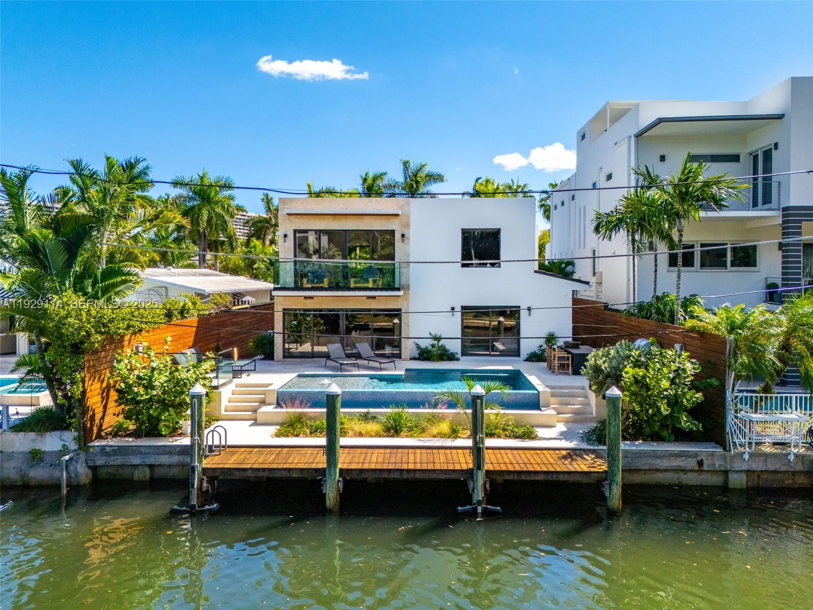 1815 Fairhaven Place Miami, FL 33133 - Photo 47 of 59 a view of swimming pool with outdoor seating