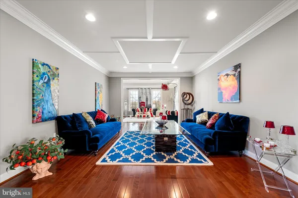 a view of a livingroom with furniture and windows
