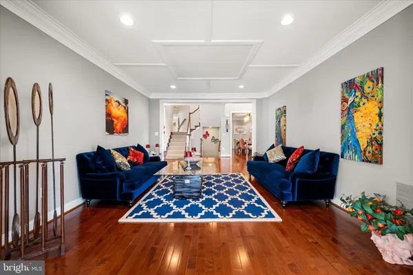 a view of a livingroom with furniture and a fireplace