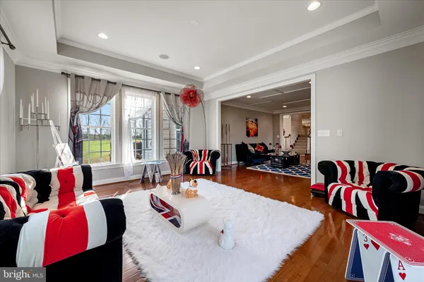 a view of a livingroom with furniture a table and chair