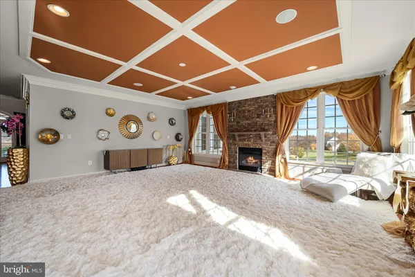 a kitchen with stainless steel appliances granite countertop a stove a sink and dishwasher wooden cabinets with granite countertops