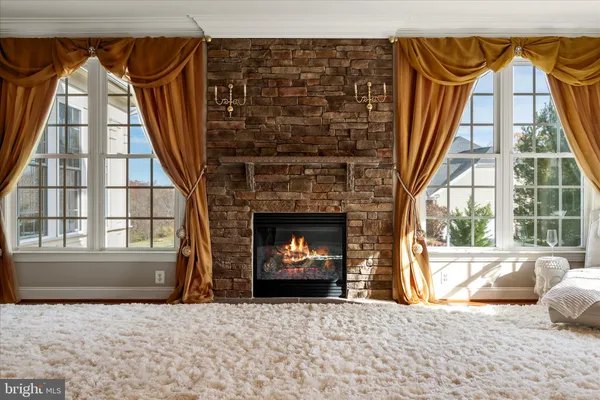 a large kitchen with stainless steel appliances granite countertop a stove and a sink