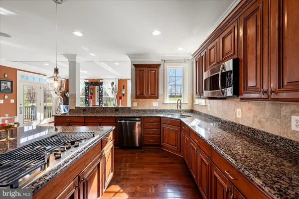 a view of a hallway view with staircase