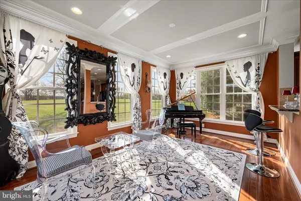 a view of living room filled with furniture and window