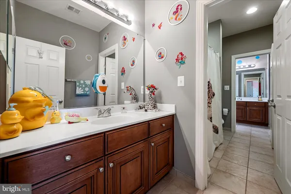 an aerial view of a house with a lake view