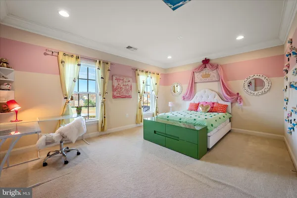 a view of a swimming pool with an outdoor seating