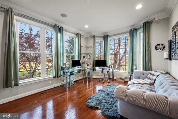a bathroom with a sink mirror and toilet